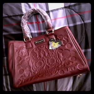 Loungefly Embossed Skull Purse